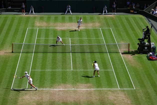 Tennis, Wimbledon, Die Highlights 10th July 2024; All England Lawn Tennis and Croquet Club, London, England; Wimbledon Tennis Tournament, Day 10; Jan Zielinski (POL) from the baseline against Heather Watson (GBR), mixed doubles round 16 match  ActionPlus12666695 JohnxPatrickxFletcher