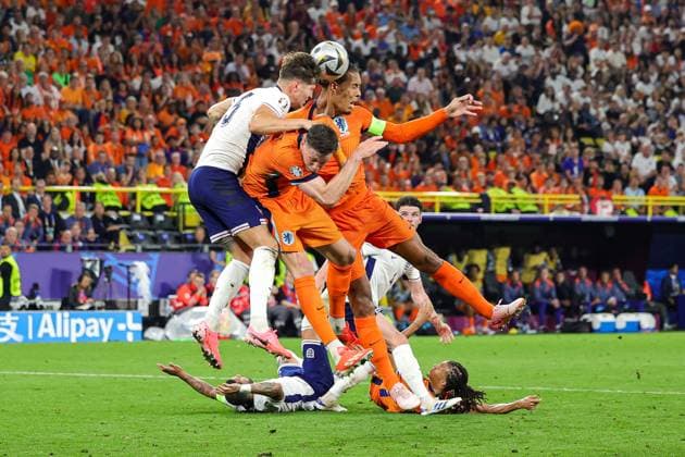Netherlands v England Euro 2024 10 07 2024. Semi Final Virgil van Dijk of Netherlands heads towards goal during the Euro 2024 semi-final match between Netherlands and England at BVB Stadion, Dortmund, Germany on 10 July 2024. Editorial use only , Copyright: xNigelxKeenex PSI-19938-0043