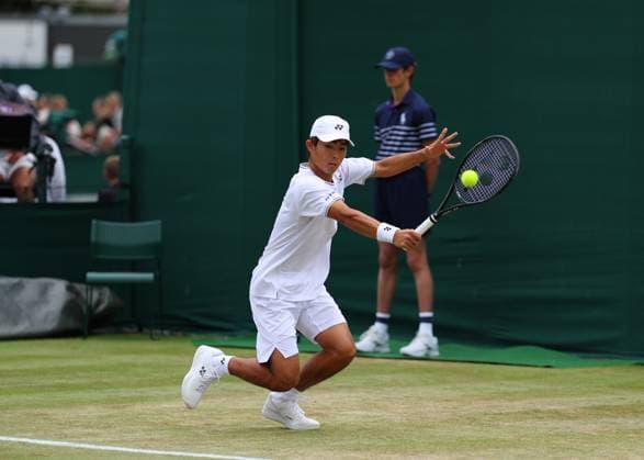 10th July 2024; All England Lawn Tennis and Croquet Club, London, England; Wimbledon Tennis Tournament, Day 10; Naoya Honda (JPN) from the baseline against Matthew Forbes (USA), boys singles second round match  ActionPlus12666912 JohnxPatrickxFletcher