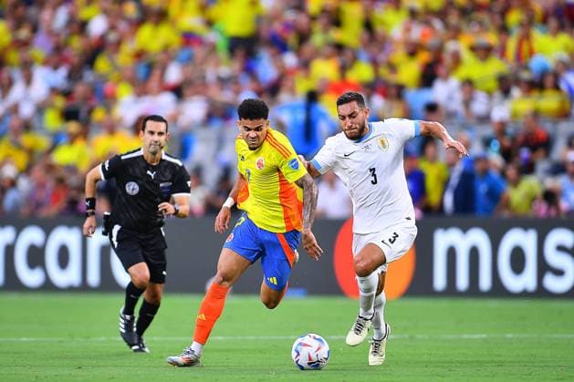 RECORD DATE NOT STATED Copa America USA 2024 Uruguay vs Colombia - Semifinal Luis Diaz (L) of Colombia fights for the ball with Sebastian Caceres (L) of Uruguay during the CONMEBOL Copa America 2024 Semi-final match between Uruguay and Colombia, at Bank of America Stadium, on July 10, 2024 in Charlotte, North Carolina, United States. CHARLOTTE NORTH CAROLINA UNITED STATES  Copyright: xAdrianxMaciasx 20240710192638_CA_SF_2024_URU_COL_DIAZ93
