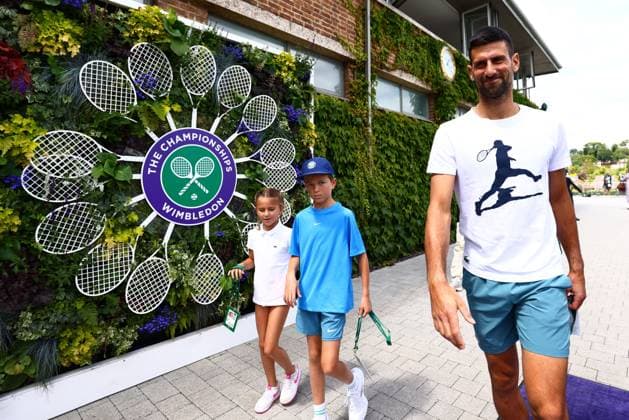 Novak Djokovic with his children Wimbledon Tennis Championships, Day 11, The All England Lawn Tennis and Croquet Club, London, UK - 11 Jul 2024  Copyright: xJamesxMarsh Shutterstockx 14580282ae