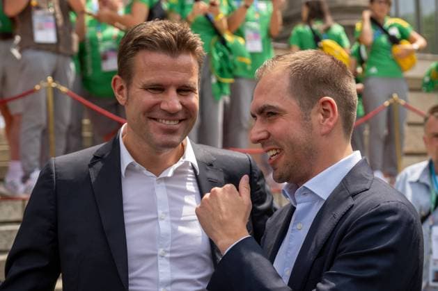 Sport Bilder des Tages Munich, Bavaria, Germany - 11 July 2024: Honoring the volunteers of the European Championships in the Lower Hofgarten in Munich. Soccer referee Felix Brych and tournament director Philipp Lahm talk