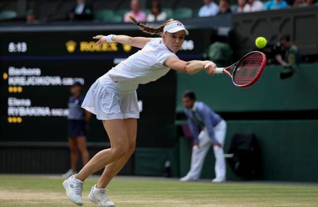 (240712) -- LONDON, July 12, 2024 -- Elena Rybakina competes during the women s singles semifinal match between Elena Rybakina of Kazakhstan and Barbora Krejcikova of Czech Republic at Wimbledon tennis Championship in London, Britain, on July 11, 2024. ) (SP)BRITAIN-LONDON-TENNIS-WIMBLEDON-WOMEN S SINGLES-SEMIFINALS HanxYan 
