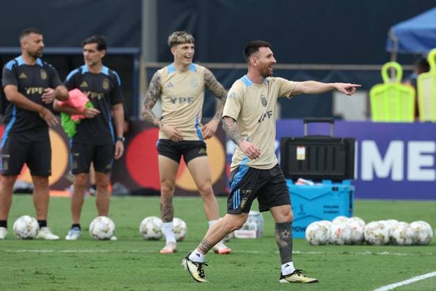 Argentina™s forwards Lionel Messi (front) and Alejandro Garcnacho take part in a training session ahead the match against Colombia for the Copa America USA 2024 final match, at Florida International University (FIU(), Miami, on July 11 2024. MIAMI UNITED STATES Copyright: xALEJANDROxPAGNIx