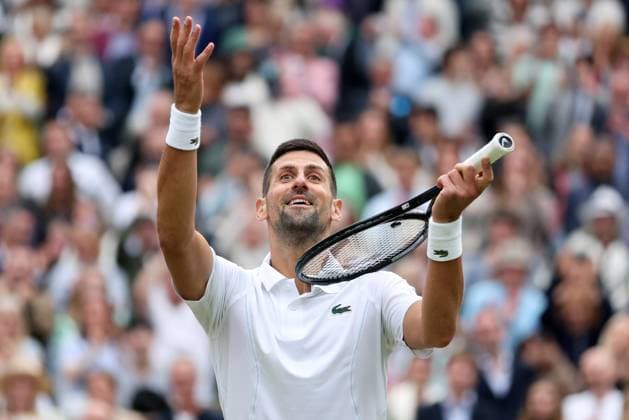 (240713) -- LONDON, July 13, 2024 -- Novak Djokovic celebrates after the men s singles simifinal match between Novak Djokovic of Serbia and Lorenzo Musetti of Italy at Wimbledon tennis Championship in London, Britain, on July 12, 2024. ) (SP)BRITAIN-LONDON-TENNIS-WIMBLEDON-MEN S SINGLES-SEMIFINALS LixYing 
