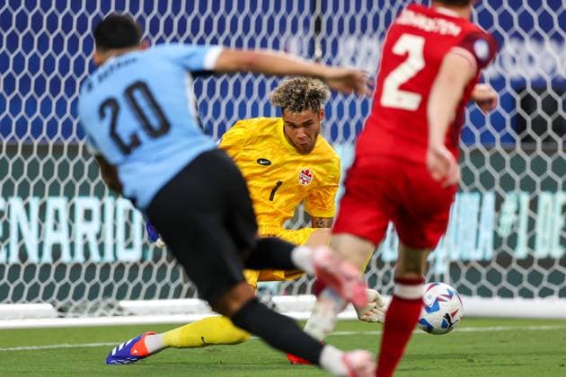 July 13, 2024, Charlotte, North Carolina, U.S: Canada goalkeeper DAYNE ST. CLAIR (1) makes a save during the first half of the CONMEBOL Copa America match between Uruguay and Canada at Bank of America Stadium in Charlotte, NC on July 13, 2024. Charlotte U.S - ZUMAk149 20240713_zsp_k149_034 Copyright: xCoryxKnowltonx