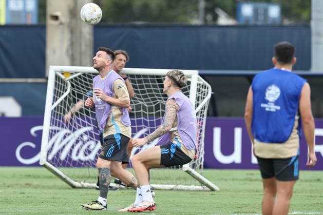 Argentina™s forward Lionel Messi (L) and forward Alejandro Garnacho take parti in a training session ahead the match against Colombia for the Copa America USA 2024 final match, at Florida International University (FIU), Miami, on July 13, 2024. MIAMI UNITED STATES Copyright: xALEJANDROxPAGNIx