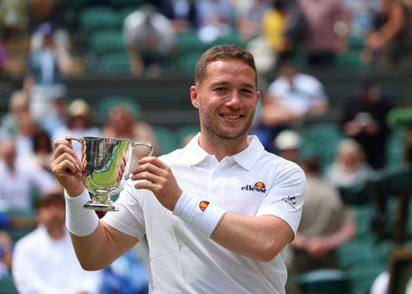 14th July 2024; All England Lawn Tennis and Croquet Club, London, England; Wimbledon Tennis Tournament, Day 14; Alfie Hewett (GBR) lifts the Gentlemen Wheelchair Singles trophy after defeating Martin De La Puente (ESP) in straight sets  ActionPlus12667778 JohnxPatrickxFletcher