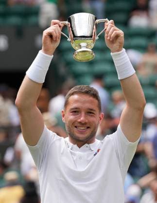 Lawn Tennis - 2024 Wimbledon Championship Mens Wheelchair Singles Final Alfie Hewitt (GBR) v Martin De la Puente (ESP) All England Lawn Tennis & Croquet Club - Sunday 14th July 2024 Alfie Hewitt (GBR) with his winners trophy 