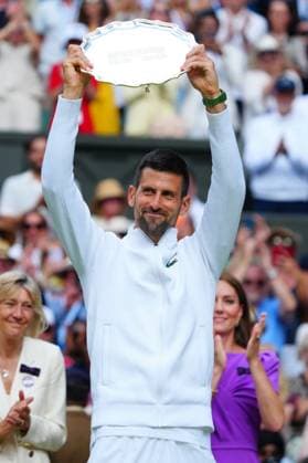 Catherine Princess of Wales presents Novak Djokovic with the runners-up trophy after defeat in the Gentlemen s Singles final Wimbledon Tennis Championships, Day 14, The All England Lawn Tennis and Croquet Club, London, UK - 14 Jul 2024  Copyright: xJavierxGarcia Shutterstockx 14584814fn