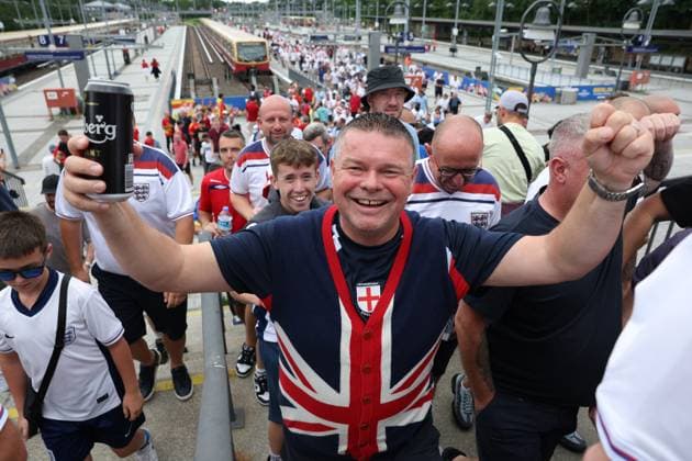 Berlin, Germany, 14th July 2024. England fans arrive prior to the UEFA European Championships final match at Olympiastadion, Berlin. Picture: Paul Terry Sportimage EDITORIAL USE ONLY. No use with unauthorised audio, video, data, fixture lists, club league logos or live services. Online in-match use limited to 120 images, no video emulation. No use in betting, games or single club league player publications. SPI-3227-0019