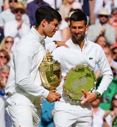 Carlos Alcaraz and Novak Djokovic after the Gentlemen s Singles final Wimbledon Tennis Championships, Day 14, The All England Lawn Tennis and Croquet Club, London, UK - 14 Jul 2024  Copyright: xJavierxGarcia Shutterstockx 14584814fq