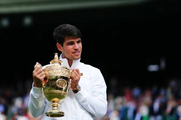 Carlos Alcaraz celebrates victory in the Gentlemen s Singles final Wimbledon Tennis Championships, Day 14, The All England Lawn Tennis and Croquet Club, London, UK - 14 Jul 2024  Copyright: xJavierxGarcia Shutterstockx 14584814gs