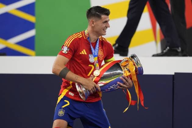 Spain s Alvaro Morata vith the trophy for the celebration after the final match between Spain and England at the Euro 2024 soccer tournament in Berlin at Olympiastadium, Germany, Sunday, July 14, 2024 - Soccer .  Copyright: xFabioxFerrari LaPressex