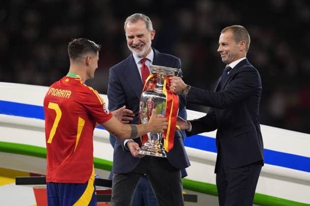 King Felipe VI of Spain and Ceferin with Spain s Alvaro Morata vith the trophy for the celebration after the final match between Spain and England at the Euro 2024 soccer tournament in Berlin at Olympiastadium, Germany, Sunday, July 14, 2024 - Soccer .  Copyright: xFabioxFerrari LaPressex