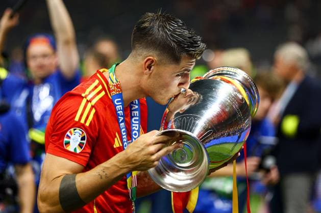 Ãlvaro Morata of Spain kisses the 2024 UEFA European Football Championship trophy Spain v England, UEFA European Championship, EM, Europameisterschaft 2024, Final, Football, Olympiastadion, Berlin, Germany, 14 Jul 2024 EDITORIAL USE ONLY No use with unauthorised audio, video, data, fixture lists, club league logos or live services. Online in-match use limited to 120 images, no video emulation. No use in betting, games or single club league player publications. Copyright: xKieranxMcManus Shutterstockx 14583341fh