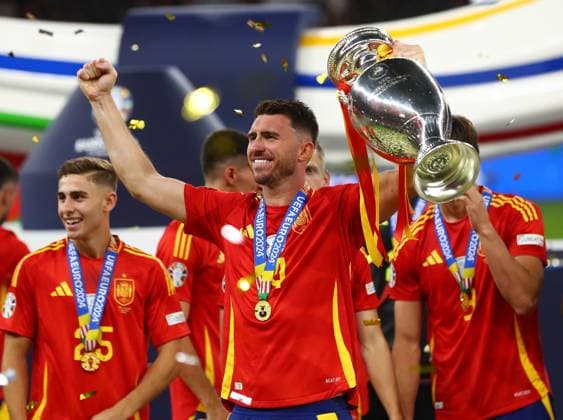 Spain v England, Berlin, UK - 14 Jul 2024 Aymeric Laporte of Spain lifts the Euros Trophy after the UEFA EURO, EM, Europameisterschaft,Fussball 2024 Final match between Spain and England at Olympistadion, Berlin on 14 July 2024 ( Berlin Olympistadion Berlin Germany Copyright: xMicahxCrook PPAUKx PPA-123593