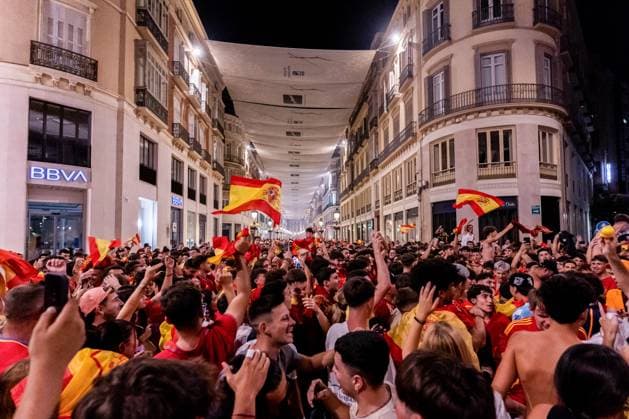 July 15, 2024, Malaga, Spain: Spain football fans seen celebrating at Marques de Larios street in Malaga the victory of Spain at the UEFA EURO, EM, Europameisterschaft,Fussball 2024. Spain won the UEFA Euro 2024 after a match against England celebrated at Olympiastadion in Berlin, Germany. Malaga Spain - ZUMAs197 0711375387st Copyright: xFrancisxGonzalezx