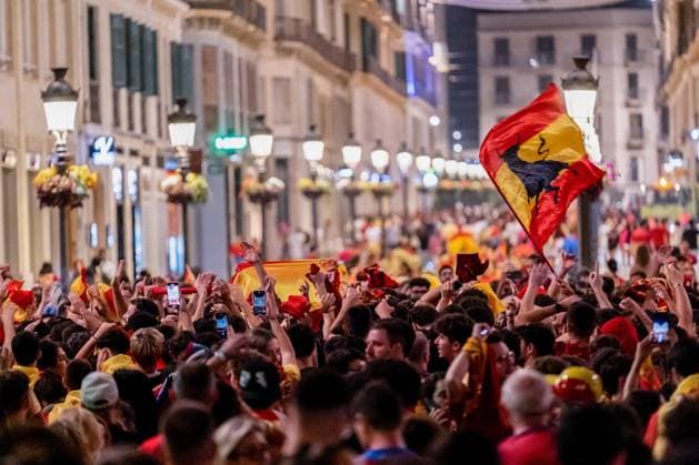 July 15, 2024, Malaga, Spain: Spain football fans seen celebrating at Marques de Larios street in Malaga the victory of Spain at the UEFA EURO, EM, Europameisterschaft,Fussball 2024. Spain won the UEFA Euro 2024 after a match against England celebrated at Olympiastadion in Berlin, Germany. Malaga Spain - ZUMAs197 0711375876st Copyright: xFrancisxGonzalezx