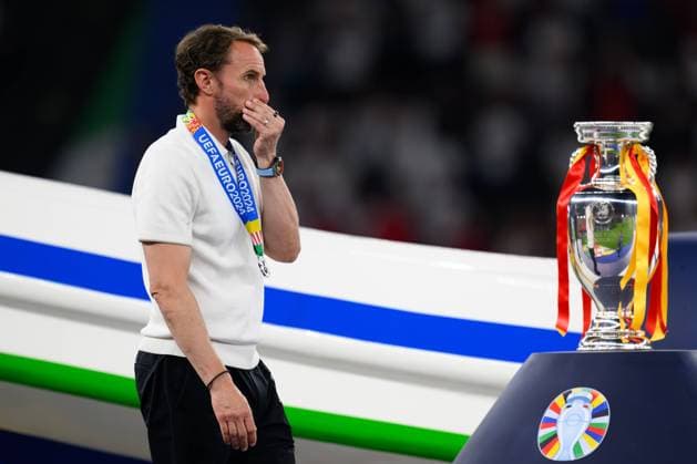 140724 KAI SCHWOERER Head Coach Gareth Southgate of England walks past the UEFA EURO, EM, Europameisterschaft,Fussball 2024 Henri Delaunay Cup after the loss in the UEFA Euro 2024 final match between Spain and England at Olympiastadion on July 14, 2024 in Berlin, Germany. 140724-CPL-ESPvENG-068