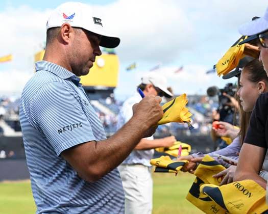 17th July 2024; Royal Troon Golf Club, Troon, South Ayrshire, Scotland; The Open Championship Practice Day 3; Gary Woodland signs an autograph for a fan  ActionPlus12669267 StevenxFlynn