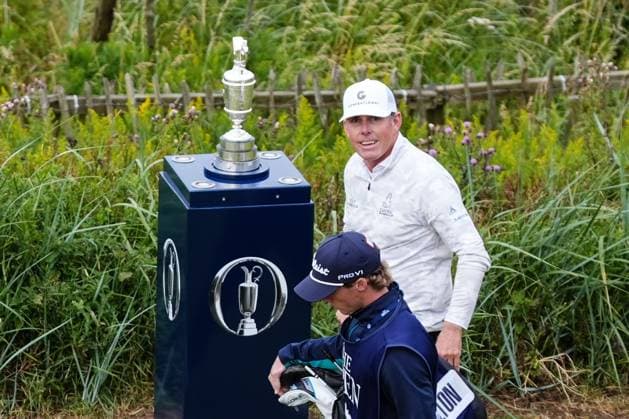 Jason Leonard (USA) walks past the Claret Jug after playing the first tee shot of the 2024 Open Championship at 06:35 with playing partners Todd Hamilton (USA) & Jack McDonald (SCO). The British Open Championship, Day One, Golf, Royal Troon, Troon, UK - 18 July 2024  Copyright: xStuartxWallace Shutterstockx 14588001h
