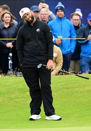 Jon Rahm looks dejected on the 14th Green The British Open Championship, Day One, Golf, Royal Troon, Troon, UK - 18 July 2024  Copyright: xGreigxCowie Shutterstockx 14587994bb