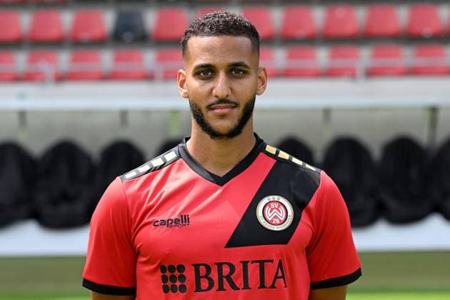 18.07.2024, xjhx, Fussball 3.Liga, SV Wehen Wiesbaden - Fototermin Saison 2024 25, Porträttermin 2024 2025 emspor, v.l. Amin Farouk (DFL DFB REGULATIONS PROHIBIT ANY USE OF PHOTOGRAPHS as IMAGE SEQUENCES and or QUASI-VIDEO) Wiesbaden