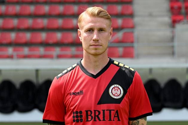 18.07.2024, xjhx, Fussball 3.Liga, SV Wehen Wiesbaden - Fototermin Saison 2024 25, Porträttermin 2024 2025 emspor, v.l. Bjarke Jacobsen (DFL DFB REGULATIONS PROHIBIT ANY USE OF PHOTOGRAPHS as IMAGE SEQUENCES and or QUASI-VIDEO) Wiesbaden
