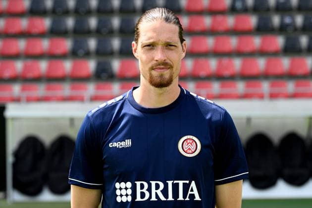 18.07.2024, xjhx, Fussball 3.Liga, SV Wehen Wiesbaden - Fototermin Saison 2024 25, Porträttermin 2024 2025 emspor, v.l. Florian Stritzel (DFL DFB REGULATIONS PROHIBIT ANY USE OF PHOTOGRAPHS as IMAGE SEQUENCES and or QUASI-VIDEO) Wiesbaden