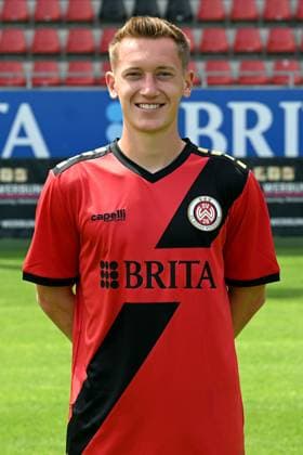 18.07.2024, xjhx, Fussball 3.Liga, SV Wehen Wiesbaden - Fototermin Saison 2024 25, Porträttermin 2024 2025 emspor, v.l. Fabian Greilinger (DFL DFB REGULATIONS PROHIBIT ANY USE OF PHOTOGRAPHS as IMAGE SEQUENCES and or QUASI-VIDEO) Wiesbaden