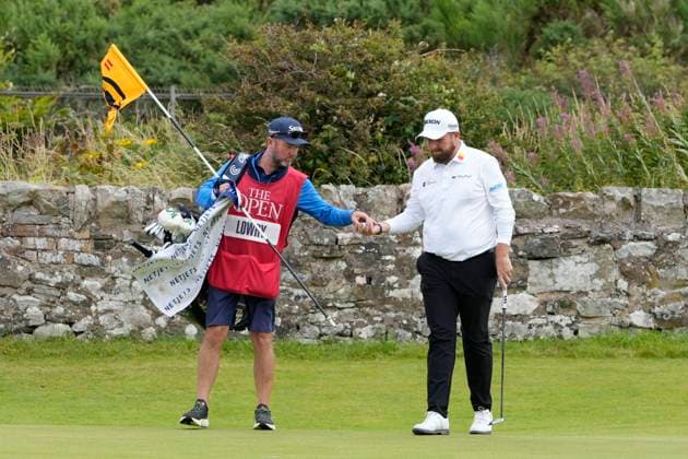 19th July 2024; Royal Troon Golf Club, Troon, South Ayrshire, Scotland; The Open Championship Round 2; Shane Lowry review his ball from his caddy on the 11th hole  ActionPlus12669962 StevenxFlynn