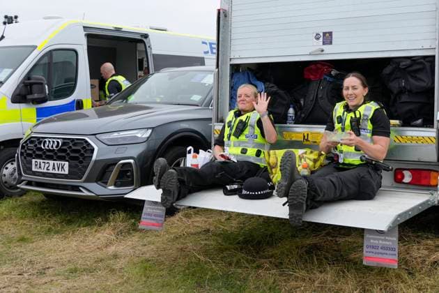 20th July 2024; Royal Troon Golf Club, Troon, South Ayrshire, Scotland; The Open Championship Round 3; Police Scotland officers take a break from action  ActionPlus12670027 StevenxFlynn
