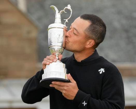 21st July 2024; Royal Troon Golf Club, Troon, South Ayrshire, Scotland; The Open Championship Final Round; Xander Schauffele kisses the Claret Jug after his victory with a score of 9 under par  ActionPlus12670922 StevenxFlynn