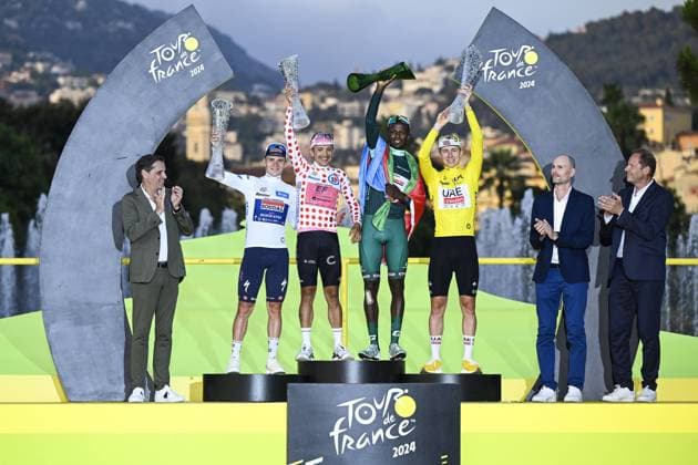 Bilder des Jahres 2024, Sport 07 Juli Sport Themen der Woche KW 29 Sport Bilder des Tages Belgian Remco Evenepoel of Soudal Quick-Step, Ecuadorian Richard Carapaz of EF Education-EasyPost , Eritrean Biniam Girmay Hailu of Intermarche-Wanty and Slovenian Tadej Pogacar of UAE Team Emirates pictured on the podium after stage 21, the final stage of the 2024 Tour de France cycling race, an individual time trial from Monaco to Nice, France (33,7 km) on Sunday 21 July 2024. The 111th edition of the Tour de France starts on Saturday 29 June and will finish in Nice, France on 21 July. TOM GOYVAERTS TomxGoyvaerts  x96854110x