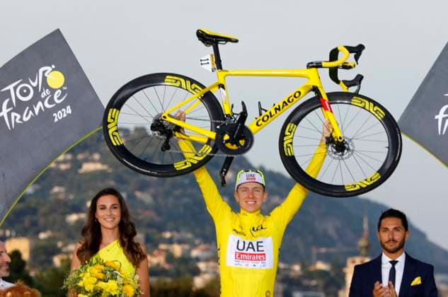 Tour De France - Tadej Pogacar Wins Third Title Slovenian Tadej Pogacar of UAE Team Emirates crosses the finish line to win the 2024 Tour de France cycling race, from Monaco to Nice, in France, on Sunday 21 July 2024. The 111th edition of the Tour de France starts on Saturday 29 June and finish in Nice, France on 21 July. Photo by Patrick Aventurier ABACAPRESS.COM Nice France  Copyright: xAventurierxPatrick ABACAx
