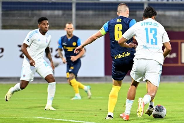 Celje, Slovenia, 24th 2024: David Zec of Celje (2R) in action against David Strelec of Slovan Bratislava (R) during the UEFA Champions League 2nd qualifying round football match between Celje (Slovenia) and Slovan Bratislava (Slovakia) at Stadium Celje, Celje, Slovenia. (Igor Kupljenik SPP) Copyright: xIgorxKupljenikx xSPPx spp-en-IgKuSp-IK0_1364