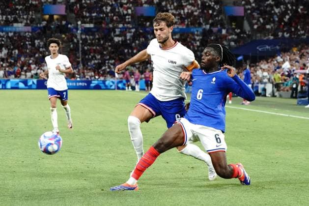 Manu Koné (France) and Tanner Tessmann (USA), Football , France vs USA during the Olympic Games, Olympische Spiele, Olympia, OS Paris 2024 JO 2024 : FOOTBALL - France vs Etats Unis - Jeux Olympiques 2024 - Paris2024 - Marseille - 24 07 2024 DPPI Panoramic 