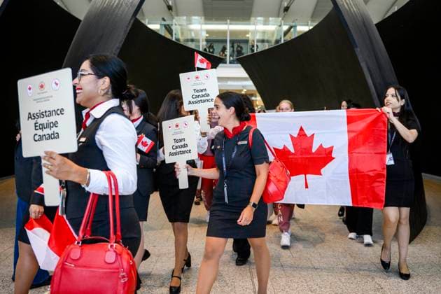 July 24, 2024, Toronto, On, Canada: Members of Air Canada and the 2024 Canadian Olympic Team celebrate as they arrive at Pearson Airport prior to boarding a flight to Paris for the 2024 Paris Olympics, in Toronto on Wednesday, July 24, 2024. Canada News - July 24, 2024  - ZUMAc35_ 20240724_zaf_c35_086 Copyright: xChristopherxKatsarovx
