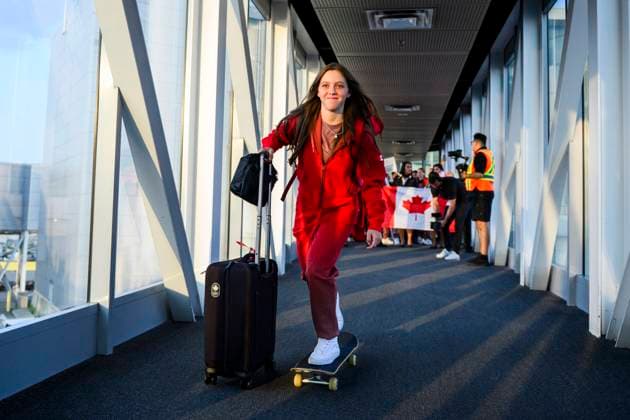 July 24, 2024, Toronto, On, Canada: 14-year old Canadian Olympic athlete in skateboarding, Fay De Fazio Ebert, skates down to board the plane headed to the 2024 Paris Olympics, in Toronto on Wednesday, July 24, 2024. Canada News - July 24, 2024 - ZUMAc35_ 20240724_zaf_c35_093 Copyright: xChristopherxKatsarovx