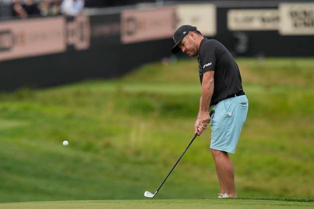 25th July 2024; JCB Golf &amp; Country Club, Rocester, Uttoxeter, England; LIV UK Golf League, Pro-Am Day; Louis Oosthuizen of the Stinger GC chips to on the fourteenth green during the Thursday Pro-Am  ActionPlus12671562 StevenxFlynn