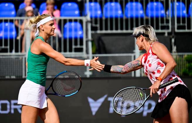 From left Czech Lucie Safarova and Bethanie Mattek-Sands of USA in action against Camilla Rosatello of Italy and Kimberley Zimmermann of Belgium during womanÂ s doubles semi-final of the WTA, Tennis Damen women s tennis tournament Livesport Prague Open 2024 in Prague, Czech Republic, July 25, 2024. (CTKxPhoto RomanxVondrous) CTKPhotoP2024072507010  CTKPhotoP2024072507010