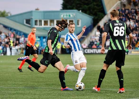 Kilmarnock v Cercle Brugge UEFA Europa League Edgaras Utkus of Cercle Brugge (left) clears under pressure from Bruce Anderson of Kilmarnock (middle) during the UEFA Europa League Second Qualifying Round First Leg match at Rugby Park, Kilmarnock UK Newspapers OUT Copyright: xFredxPalmerx FIL-20396-0100