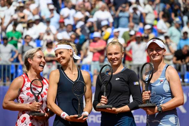 From left Bethanie Mattek-Sands of USA, Czech Lucie Safarova, Katerina Siniakova and Barbora Krejcikova pose with trophies after to the match of the WTA, Tennis Damen women s tennis tournament Livesport Prague Open 2024 in Prague, Czech Republic, July 26, 2024. (CTKxPhoto MichalxKamaryt) CTKPhotoP2024072603269  CTKPhotoP2024072603269