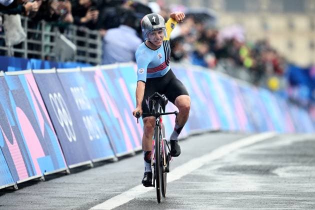 OLY24 CYCLING ROAD, Belgian cyclist Remco Evenepoel reacts after winning the the Men?s Individual Time Trial at Pont Alexandre III as part of the 2024 Paris Olympic Games, Olympische Spiele, Olympia, OS in Paris, France, Saturday, July 27, 2024. ( NO ARCHIVING, EDITORIAL USE ONLY, NO USE IN BOOKS WITHOUT CONSENT PARIS FRANCE Copyright: xJOELxCARRETTx 20240728129658493799