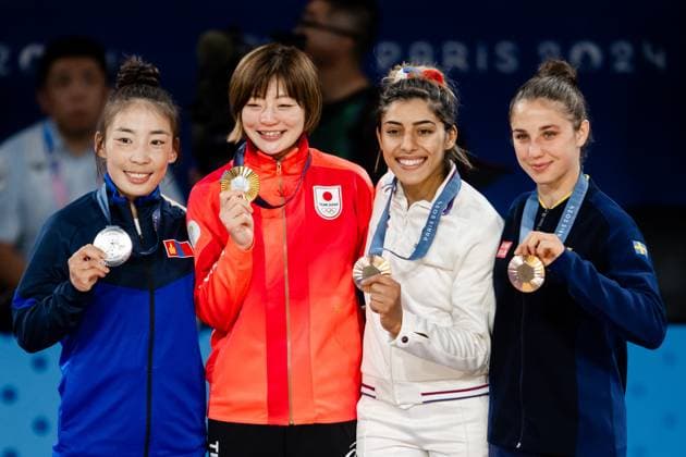 240727 Baasankhuu Bavuudorj of Mongolia, Natsumi Tsunoda of Japan, Shirine Boukli of France and Tara Babulfath of Sweden at the price ceremony after women™s -48kg judo finals during day 1 of the Paris 2024 Olympic Games, Olympische Spiele, Olympia, OS on July 27, 2024 in Paris. Photo: Ludvig Thunman BILDBYRAN kod LT LT0643 judo olympic games olympics os ol olympiska spel olympiske leker paris 2024 paris-os paris-ol 1 bbeng jubel Copyright: LUDVIGxTHUNMAN BB240727LT169
