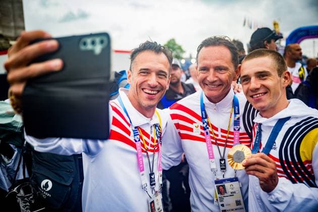 BOIC-COIB s CEO Cedric Van Branteghem, BOIC-COIB s president Jean-Michel Saive and Belgian gold medallist Remco Evenepoel pose for a selfie picture after the men s time trial event at the Paris 2024 Olympic Games, Olympische Spiele, Olympia, OS on Saturday 27 July 2024 in Paris, France . The Games of the XXXIII Olympiad are taking place in Paris from 26 July to 11 August. The Belgian delegation counts 165 athletes in 21 sports. JASPERxJACOBS  x97177045x