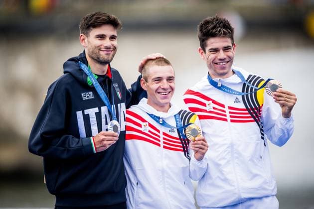 Italian silver medallist Filippo Ganna, Belgian gold medallist Remco Evenepoel and Belgian bronze medallist Wout van Aert pictured during the podium ceremony of the men s time trial event at the Paris 2024 Olympic Games, Olympische Spiele, Olympia, OS on Saturday 27 July 2024 in Paris, France . The Games of the XXXIII Olympiad are taking place in Paris from 26 July to 11 August. The Belgian delegation counts 165 athletes in 21 sports. JASPERxJACOBS  x97177112x