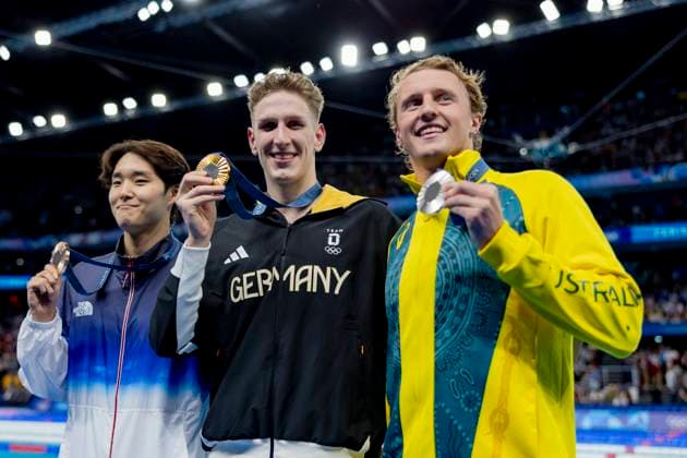 Paris, Frankreich 27.07.2024: Schwimmen Finals, Tag 1, Woomin Kim, KOR, Lukas Maertens, GER, Elijah Winnington, AUS (Photo by JoKleindl) Paris Copyright: xJoKleindlx