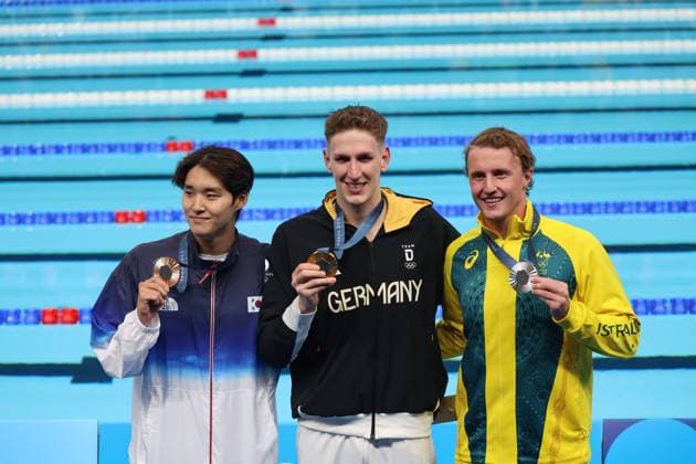 July 27, 2024, Paris, Ile de France, France: Woomin Kim (Korea), Lukas Maertens (Germany) and Elijah Winnington (Australia) in the mens 400-meter freestyle medal ceremony during the Paris 2024 Olympic Summer Games at Paris La Dfense Arena. Paris France - ZUMAm117 20240727_oly_m117_033 Copyright: xDavidxG.xMcIntyrex